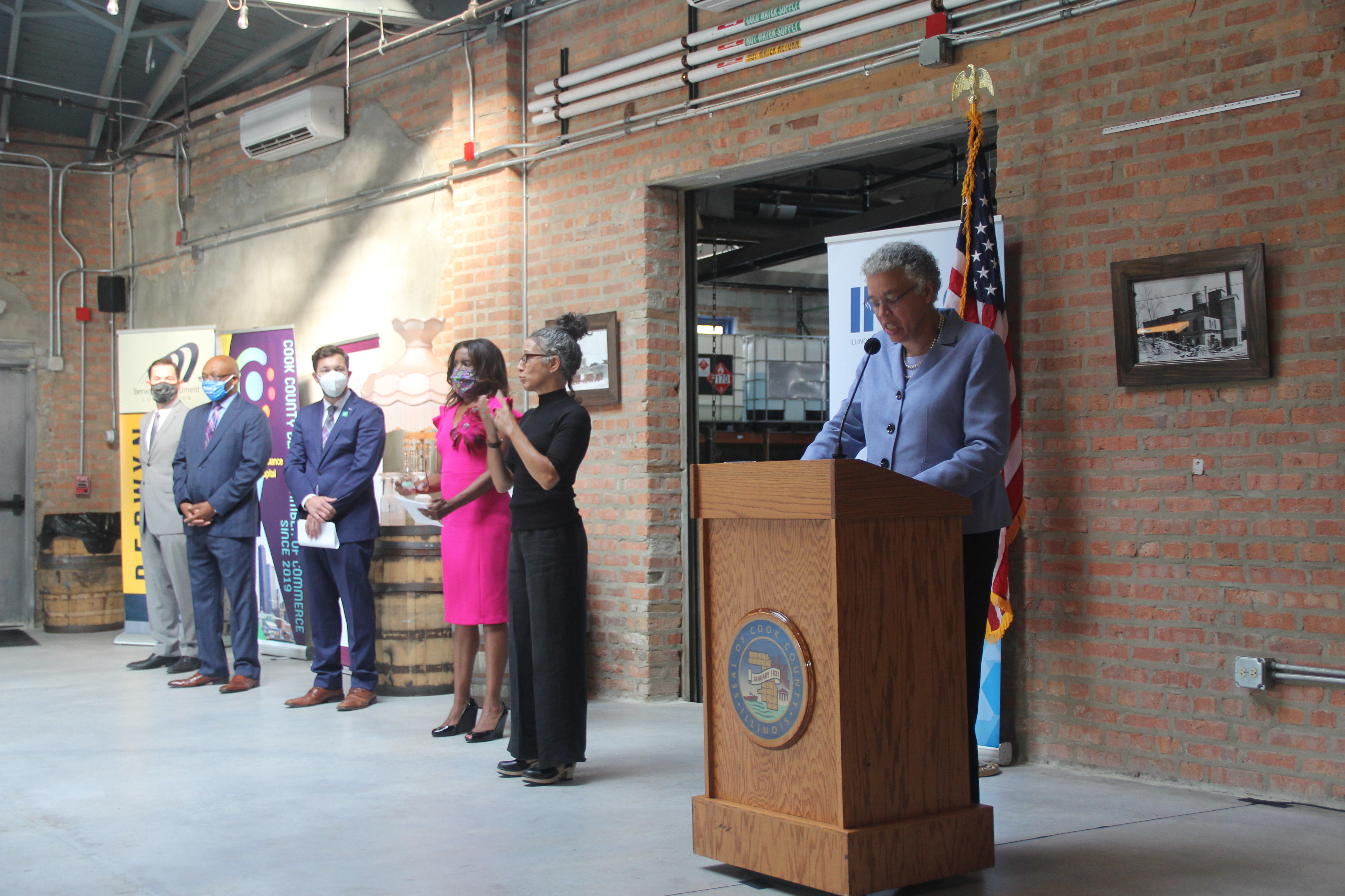 Photo of gathered dignitaries launching the Small Business Assistance program